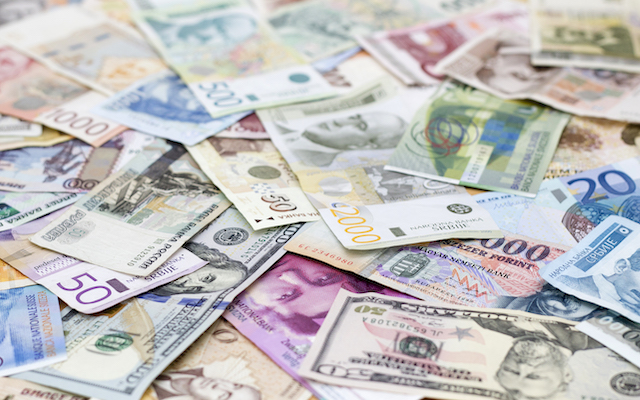 various currencies on the table