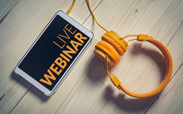 Live webinar on phone with headphones
