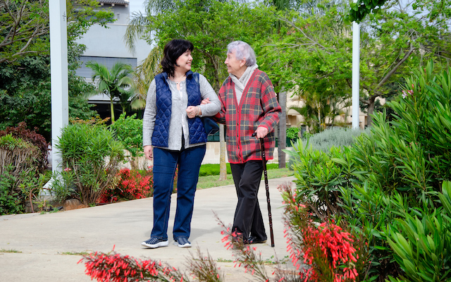 Person with Parkinson's and carer