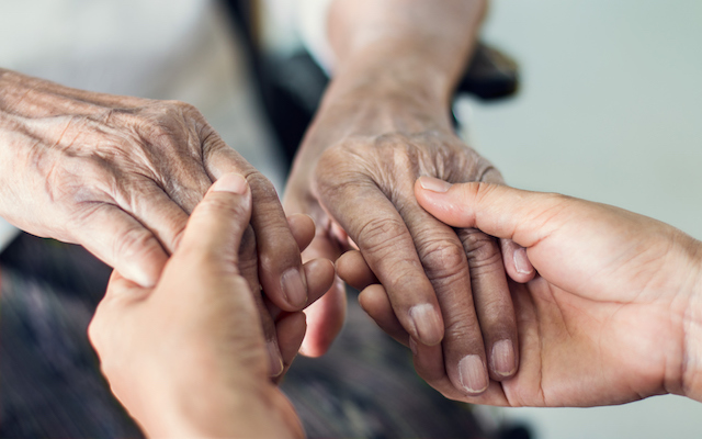 Close up hands of helping hand
