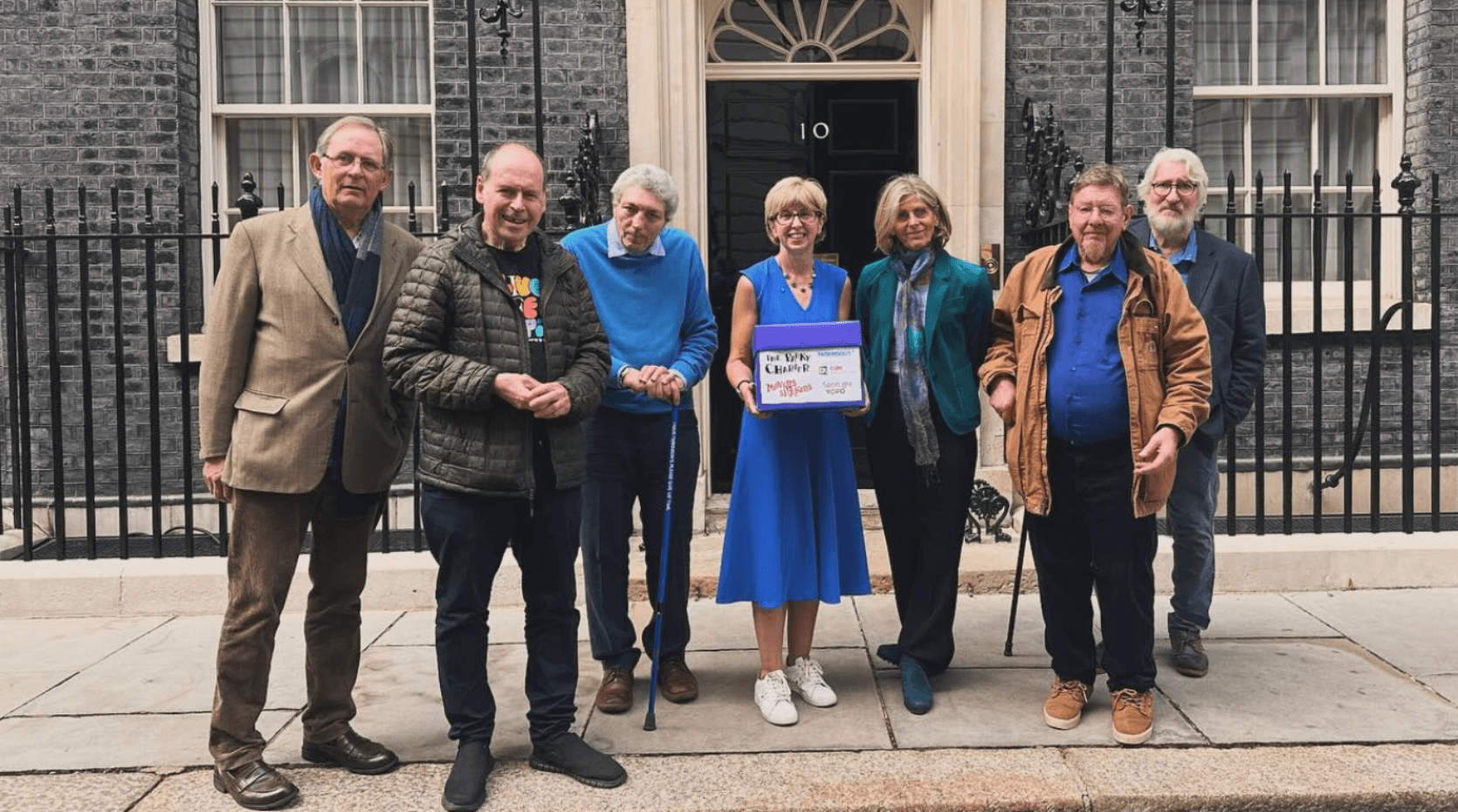 The Movers and Shakers handing in their Parky Charter to 10 Downing Street on World Parkinson's Day 2024