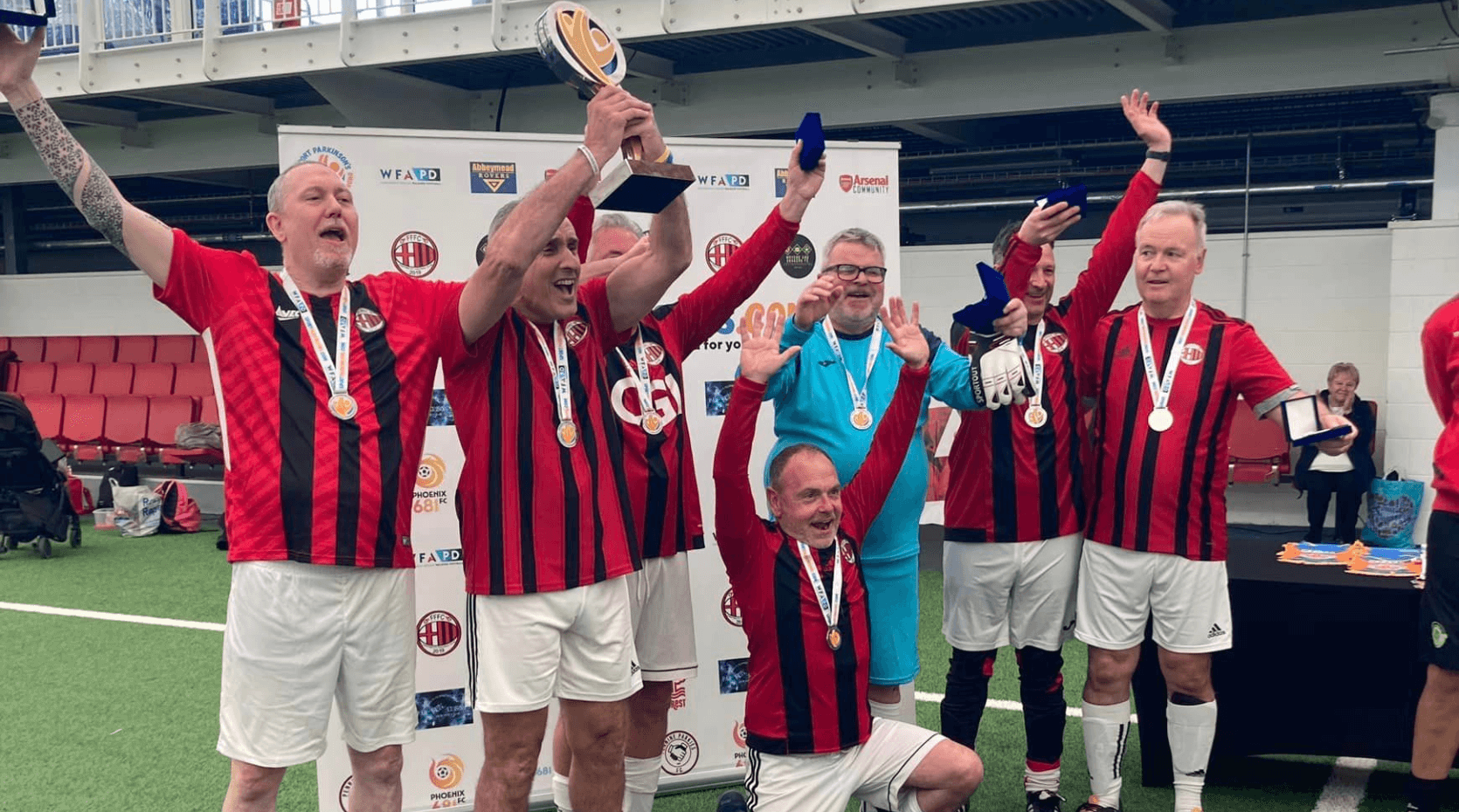 Fighting Fit Football's red team lift the Cure Parkinson's Cup 2024
