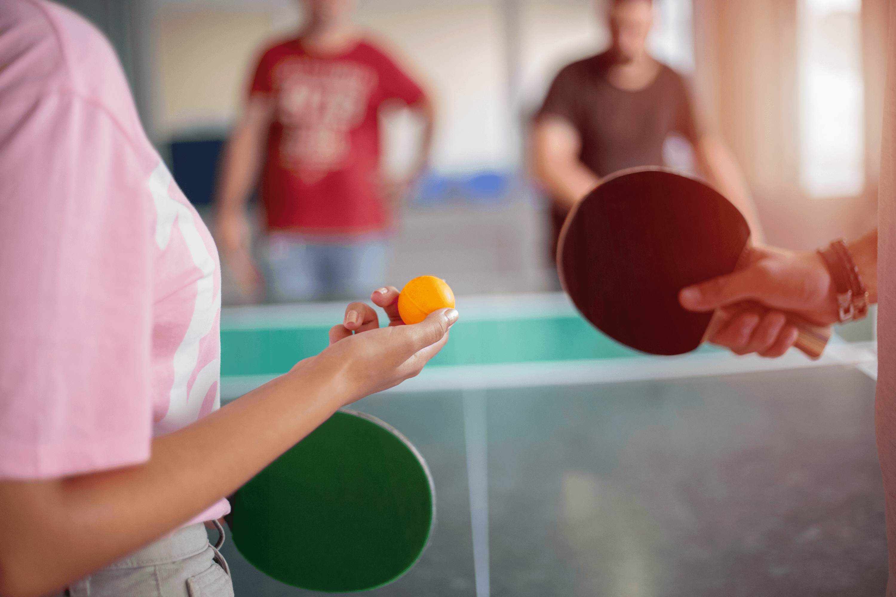 A photo of table tennis players, representing the World Parkinson's Table Tennis Championship