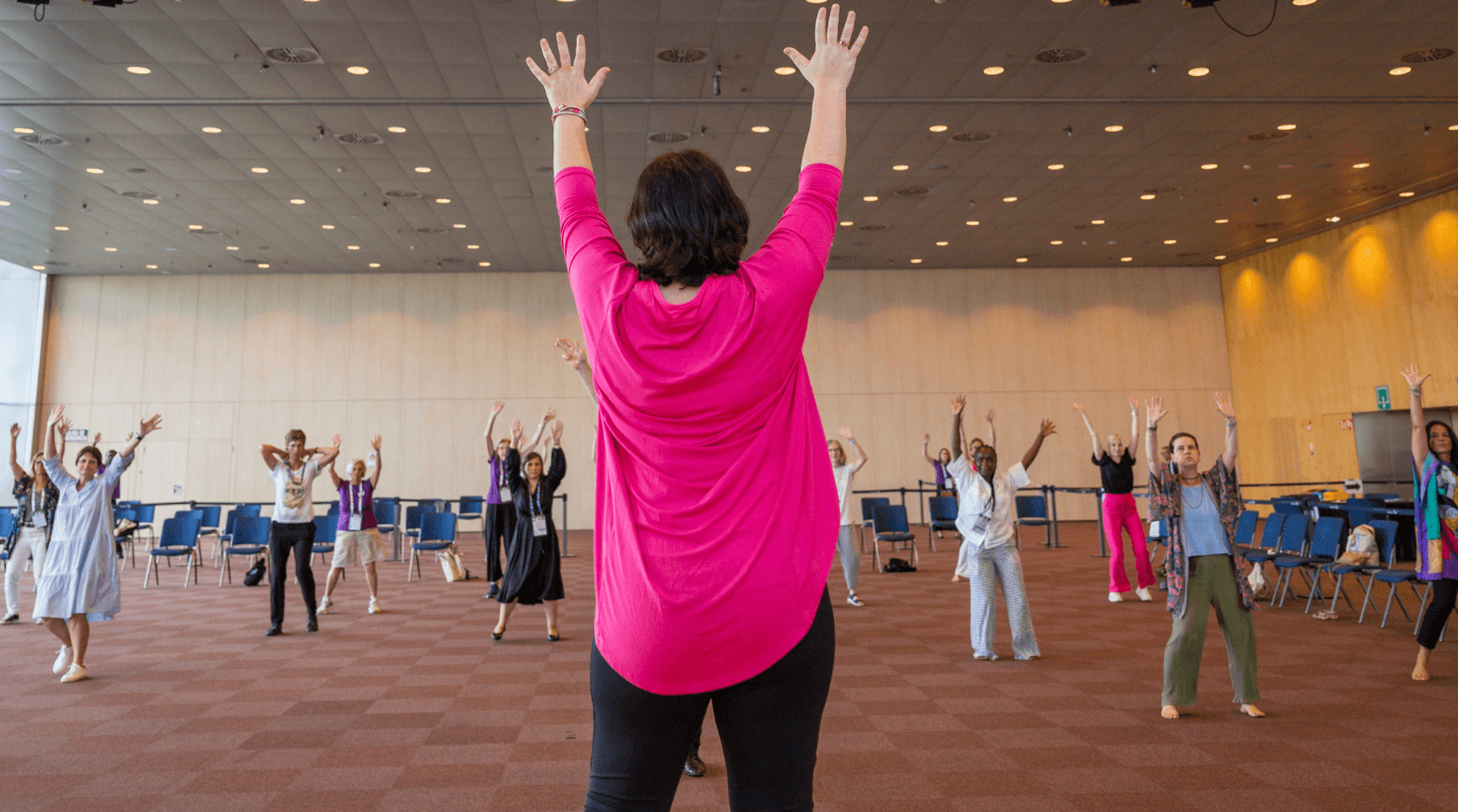 Josefa Domingos running an "exercise and Parkinson's" class at WPC 2023