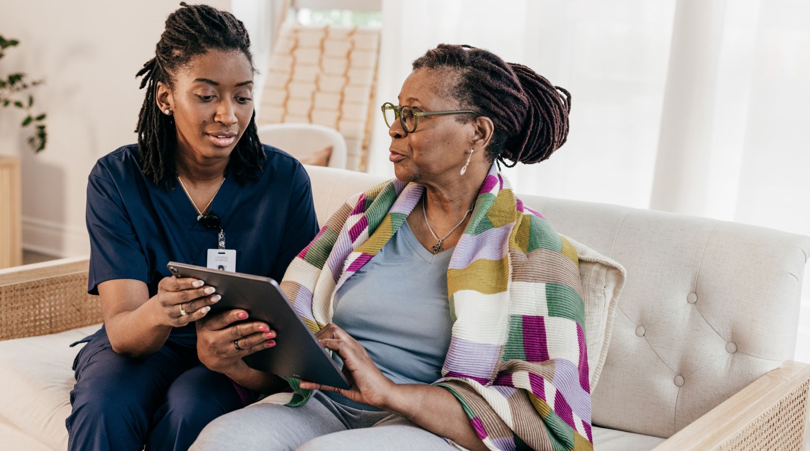 Photograph of a healthcare practitioner and a patient to represent personalised care