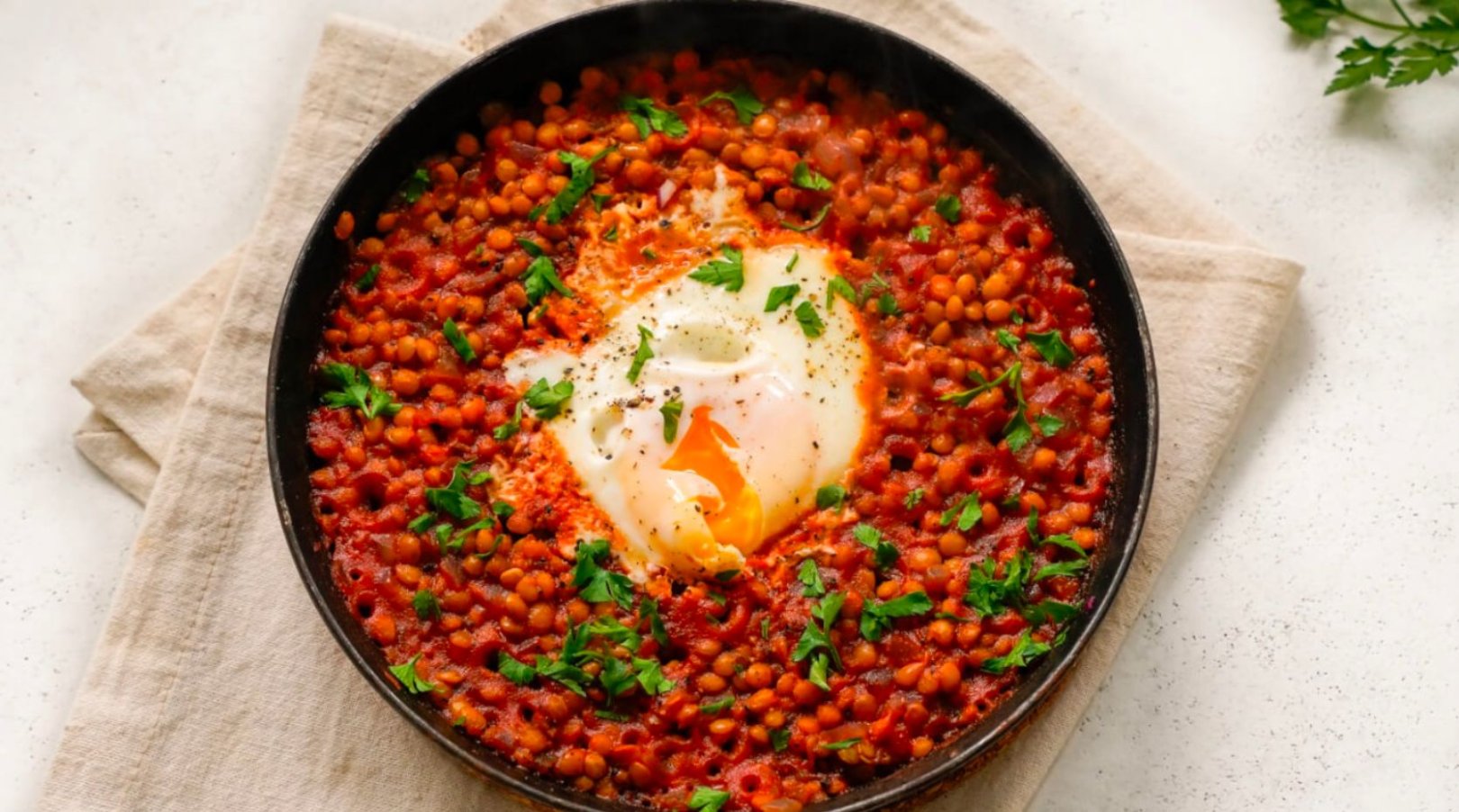 Saucy lentils and eggs recipe