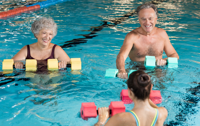 Seniors doing aqua aerobics