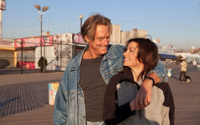 Happy mature couple on promenade