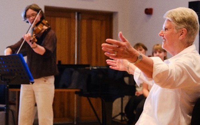 A member of the arts initiative coLab dancing.