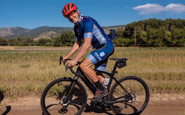 Parkinson's nonprofit founder Davis Phinney riding a bike