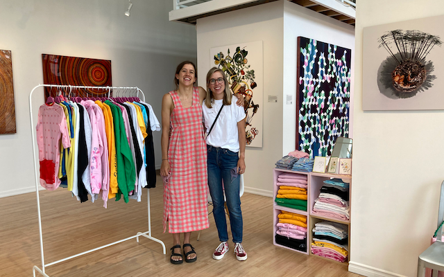 Madi and Char Kennedy pose for a photo at a Shrimp Studio event.