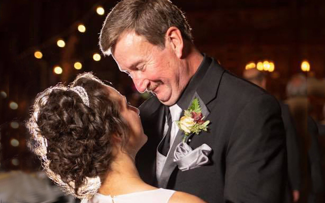 Samantha and Craig dance together at Samantha's wedding.