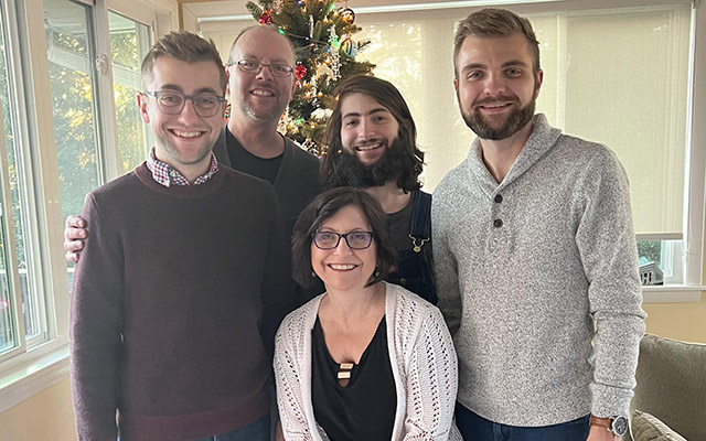 A group photo of Lori and her family.
