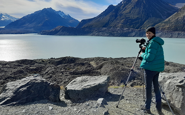 Robyn Cotton photographing Aoraki, Mount Cook New Zealand's highest mountain