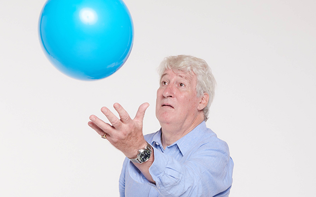 Jeremy Paxman with a balloon.