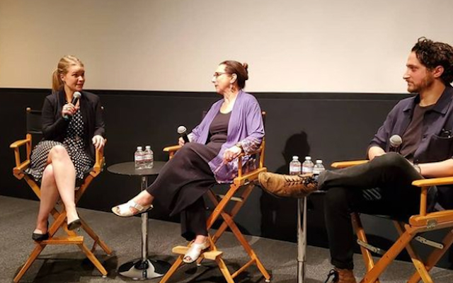 Women sitting on a panel