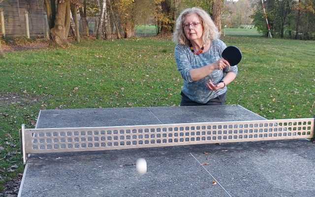 Woman playing table tennis.