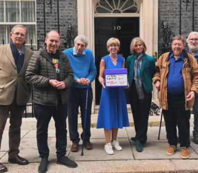 The Movers and Shakers handing in their Parky Charter to 10 Downing Street on World Parkinson's Day 2024