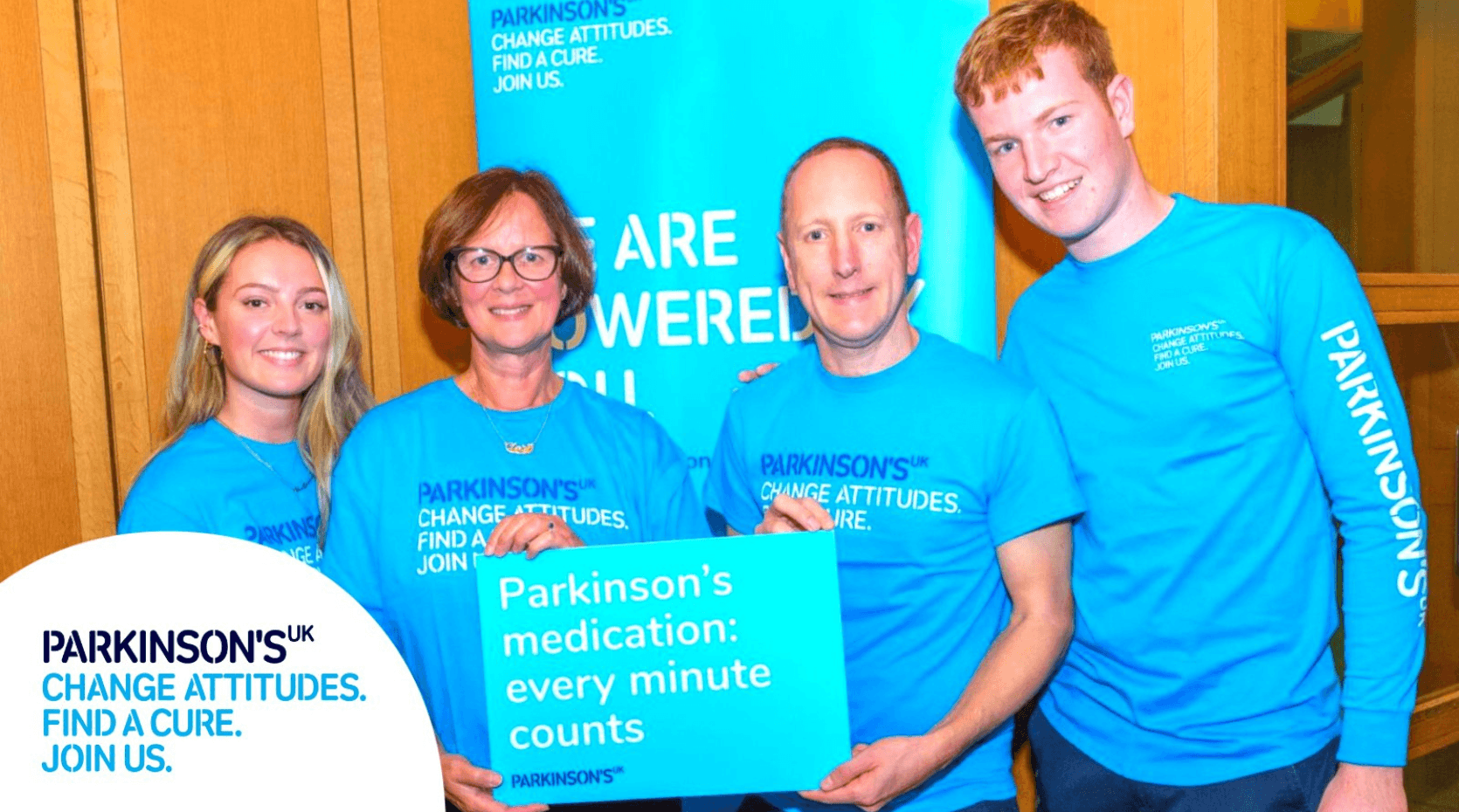 Parkinson's Life staff wearing Get It On Time campaign t-shirts
