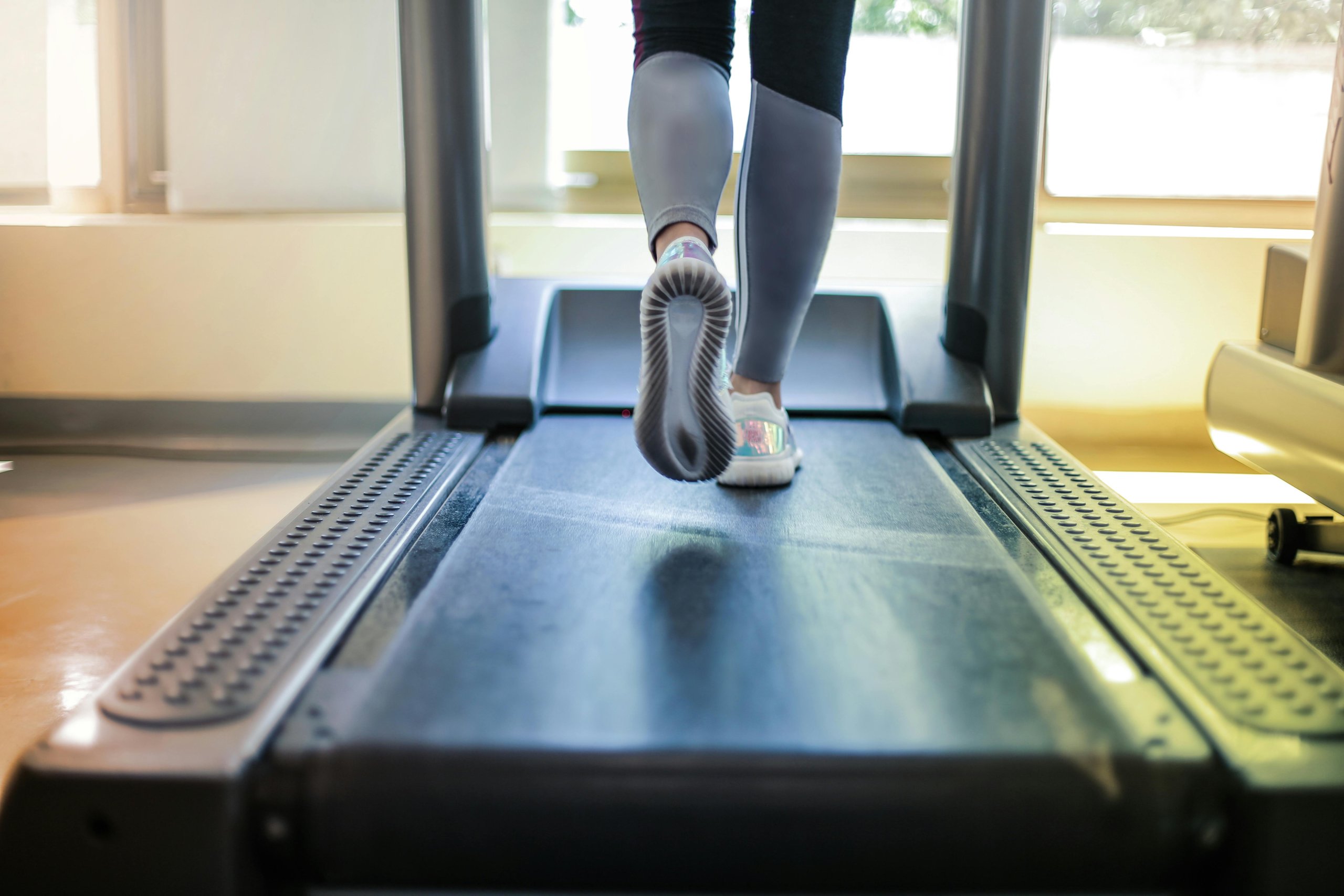 Someone running on a treadmill